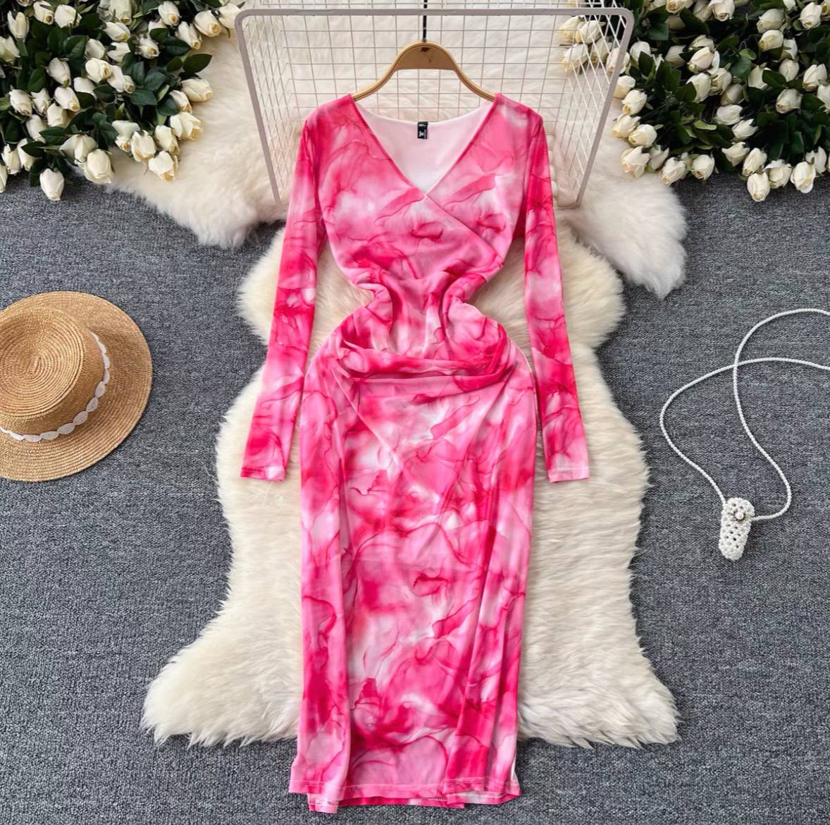 Tie-dye or abstract print midi dress with a v-neck and long sleeves dress