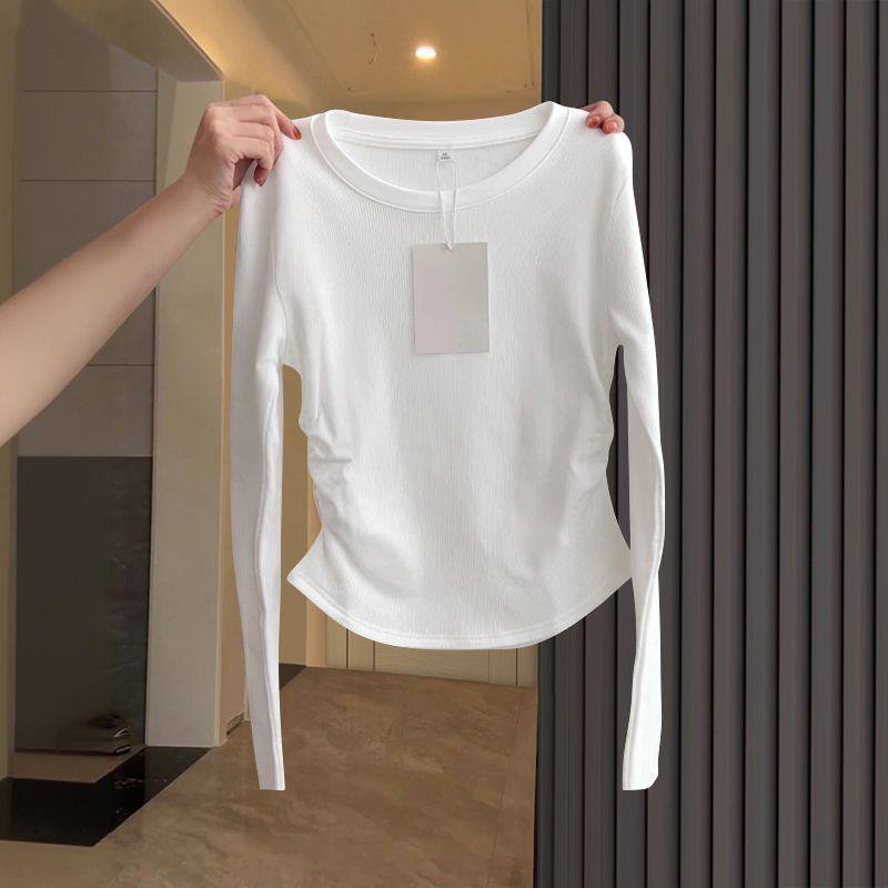 Women's white long sleeved ribbed knit top