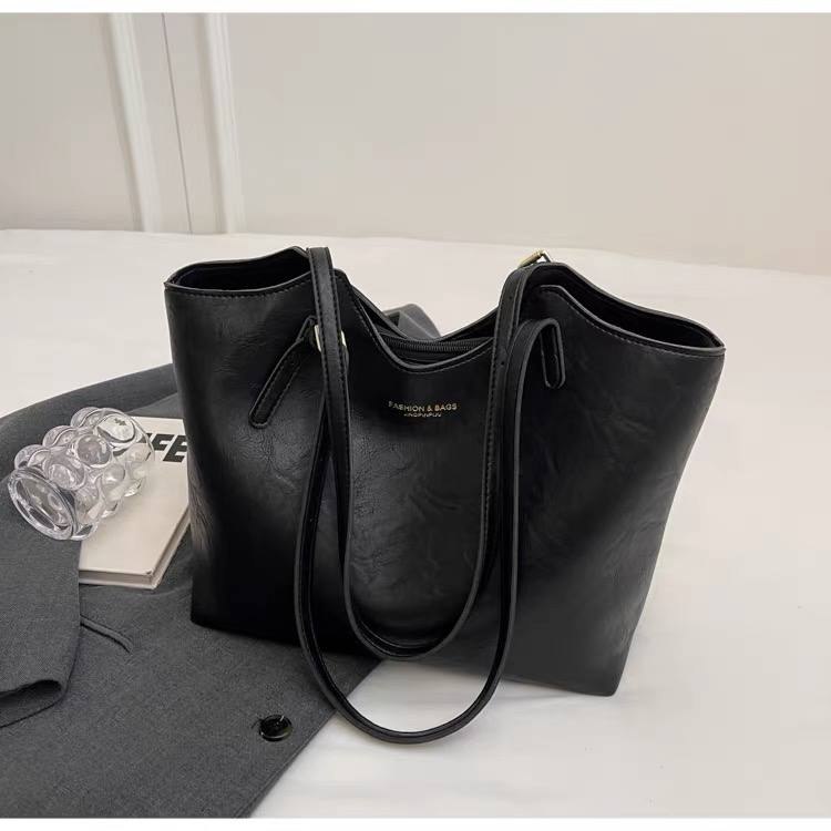 Black retro-style faux leather tote bag