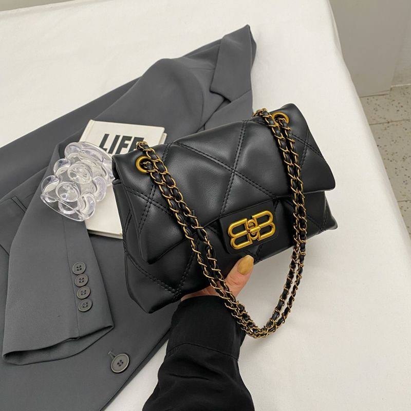 Black-colored quilted faux-leather flap crossbody shoulder bag