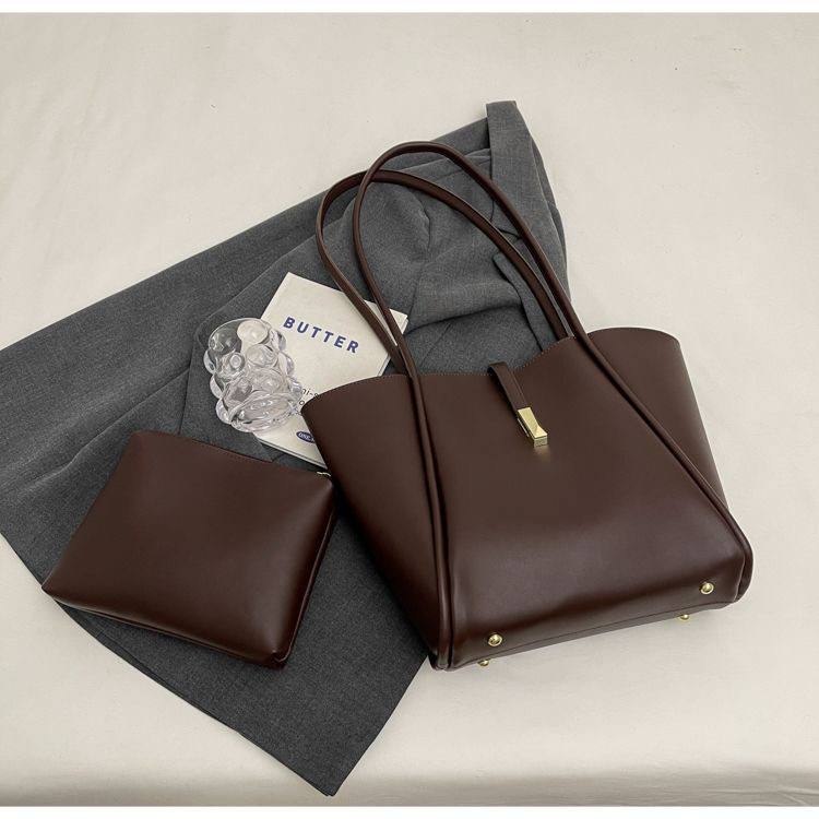 Minimalist solid-color faux leather tote bag