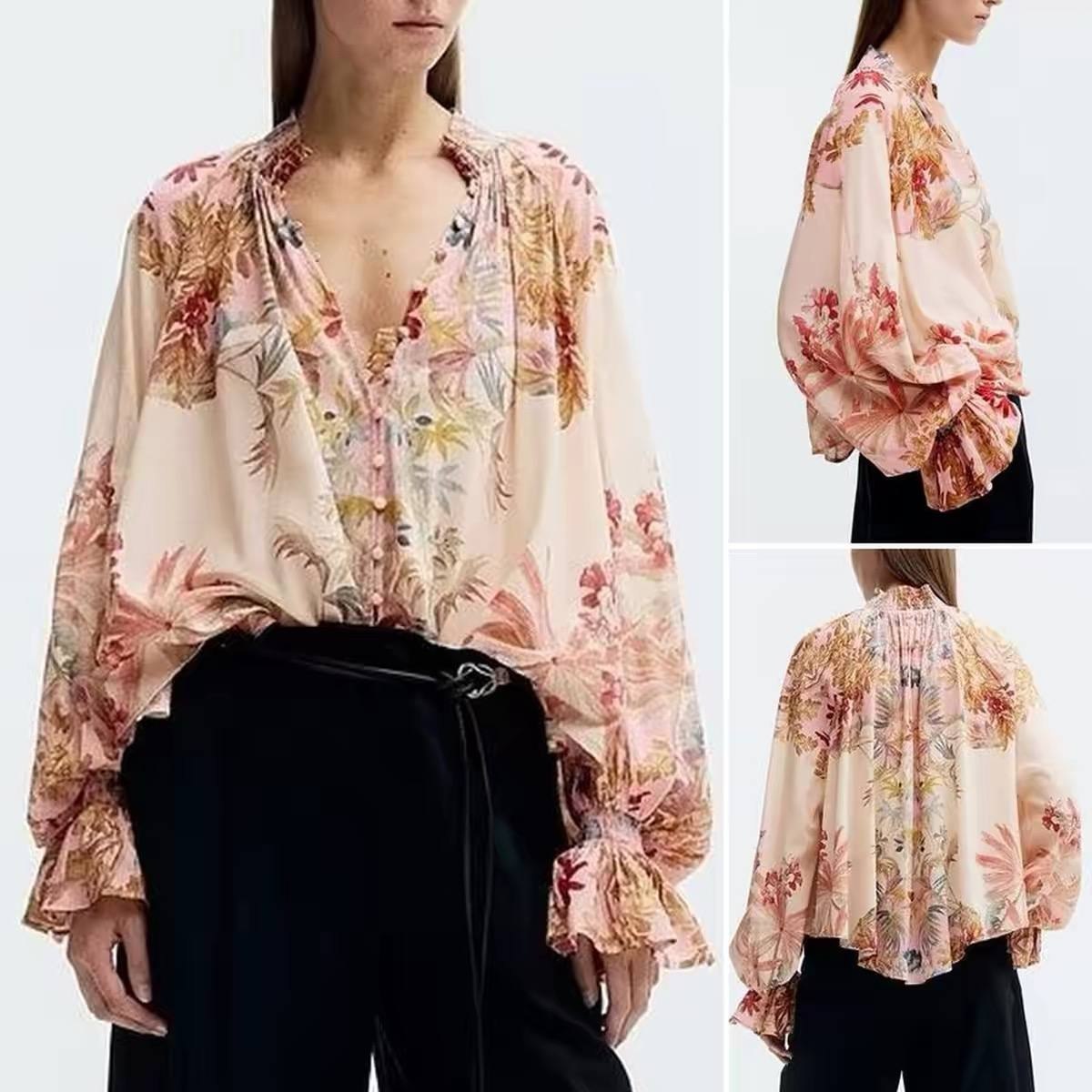 Button-front balloon-sleeved blouse by H&M