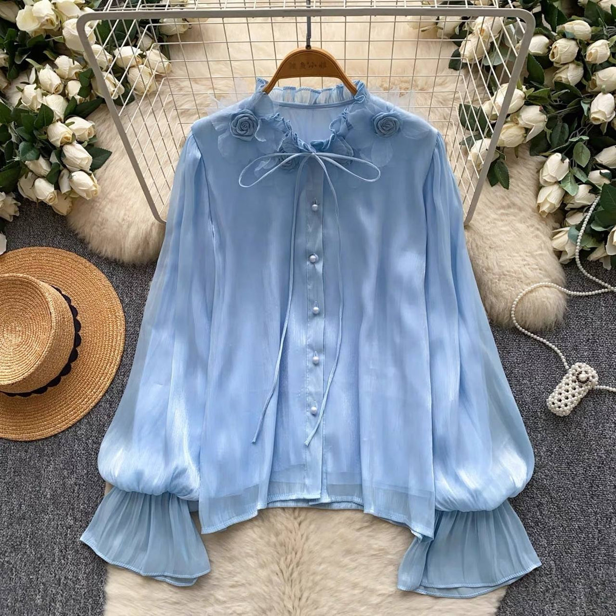 Light blue chiffon long-sleeve blouse with a ruffle collar, 3D floral accents