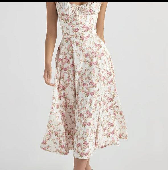White midi dress with a pink floral print