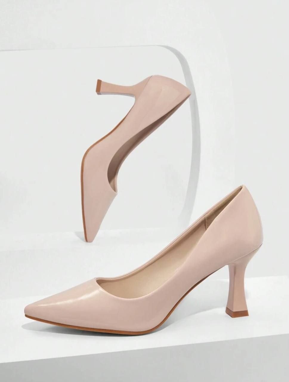 Beige elegant pointed toe pyramid heeled pumps