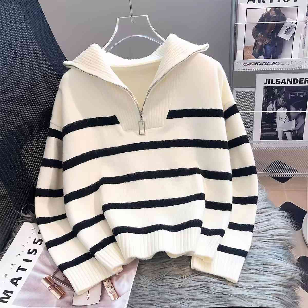 Oversized striped knit pullover sweater with a half-zipper