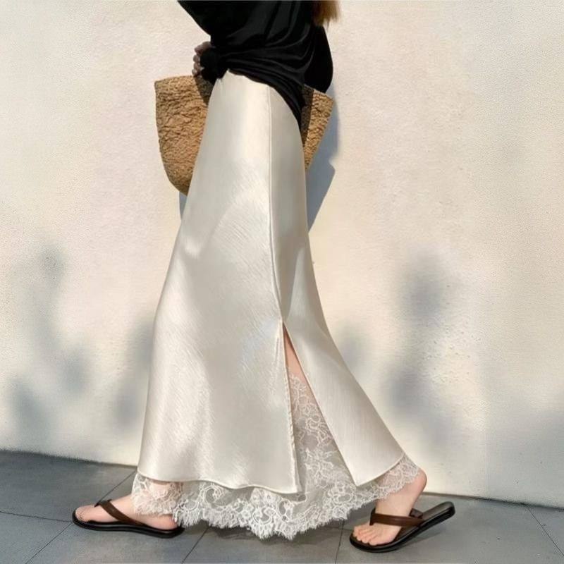 Satin side slit long skirt adorned with delicate guipure lace inserts