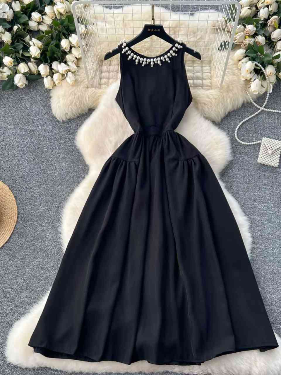 Elegant sleeveless black A-line midi dress