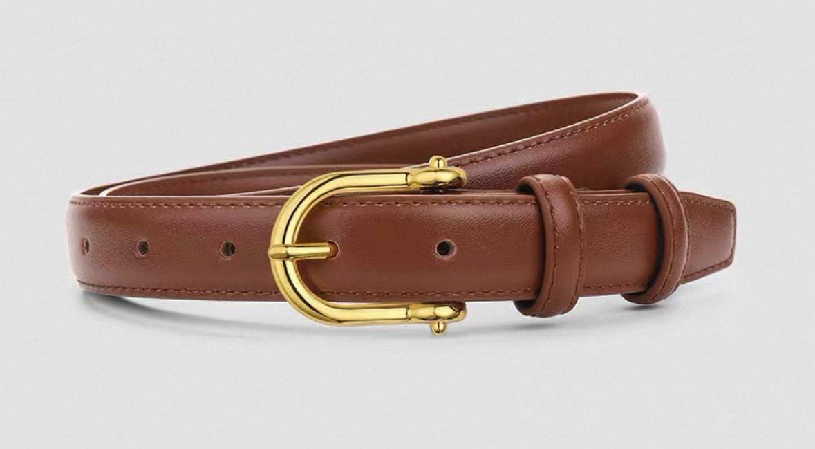 Brown leather belt features a classic