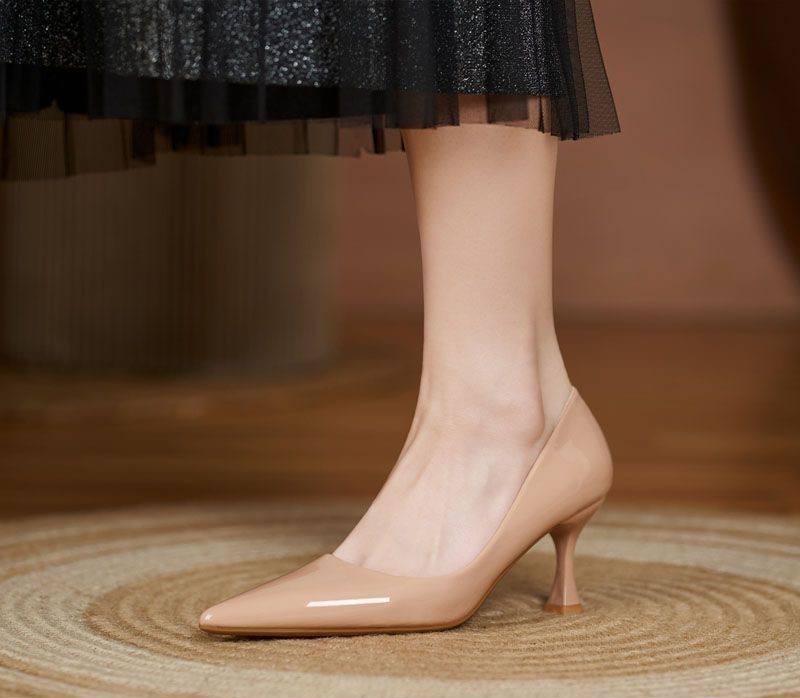 Nude patent leather pointed-toe kitten-heel pumps