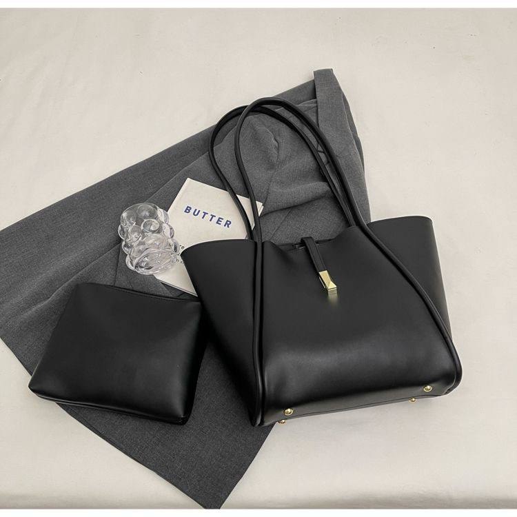 Minimalist, solid-color faux leather tote bag