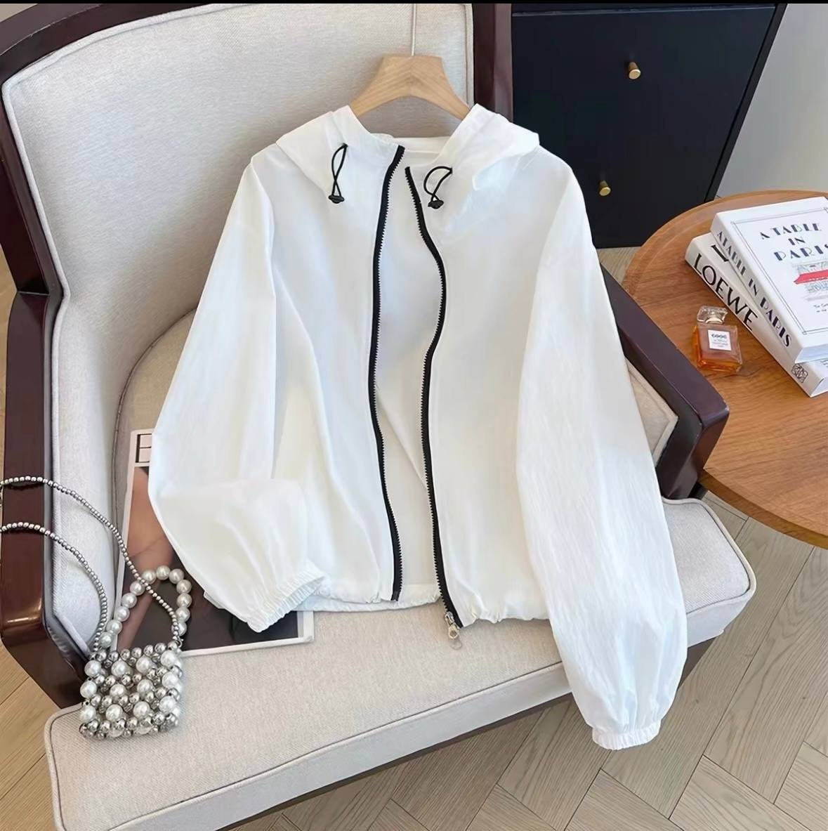 White lightweight hooded windbreaker jacket