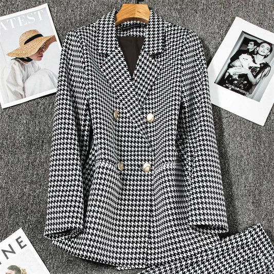 Black and white houndstooth blazer and trousers set