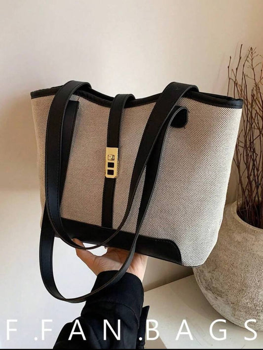 structured canvas tote bag with contrast leather trim