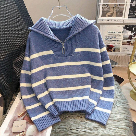 Oversized blue and white striped knit pullover sweater featuring a half zip neckline and a wide sailor style lapel collar