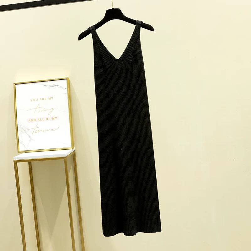Black, sleeveless, v-neck long dress with a ribbed texture