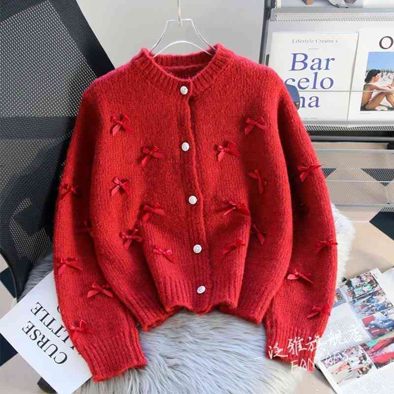 Red coquette-style bow cardigan