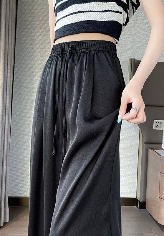 High-waisted wide-leg trousers
