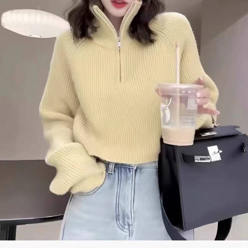 Cropped half-zip ribbed knit sweater