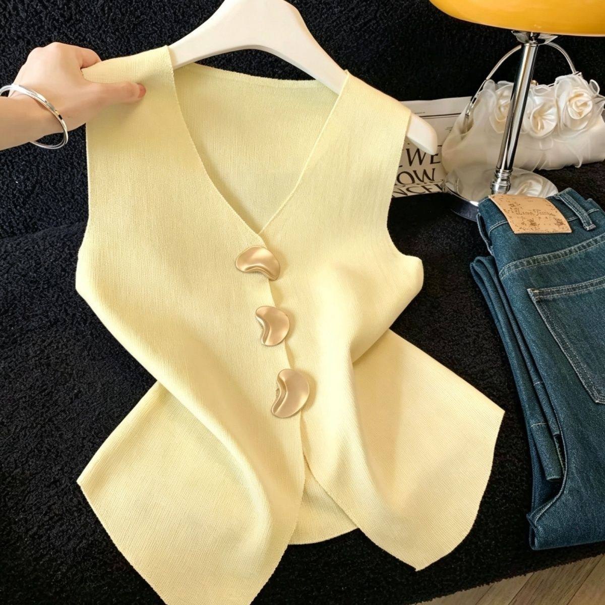 Pale yellow sleeveless V-neck knit