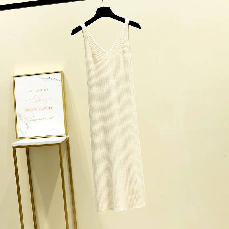 White, sleeveless, v-neck long dress with a ribbed texture