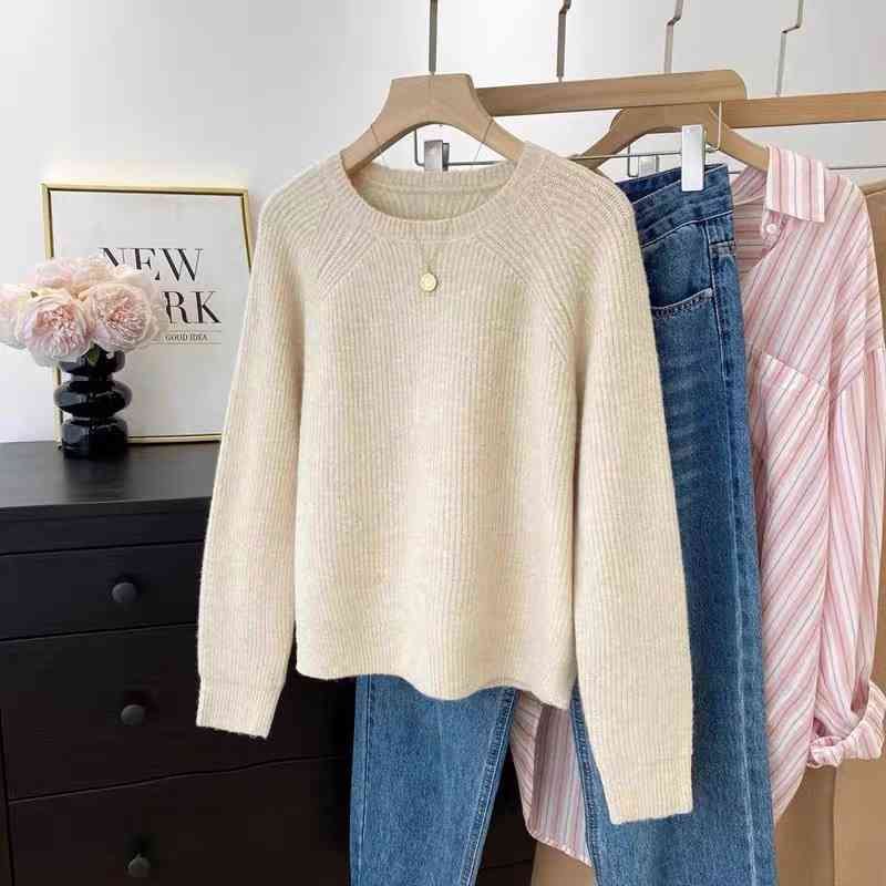 Classic cream-colored raglan sweater