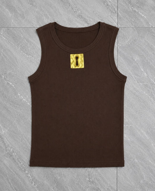 Ribbed knit tank top featuring a prominent gold metallic keyhole patch