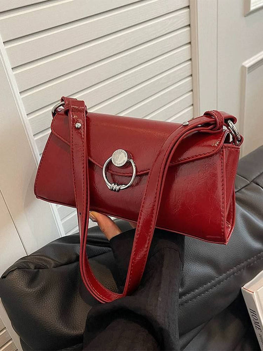 Red patent faux leather baguette or shoulder bag