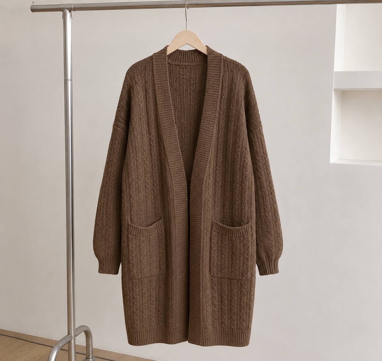 Long, oversized cable-knit cardigan
