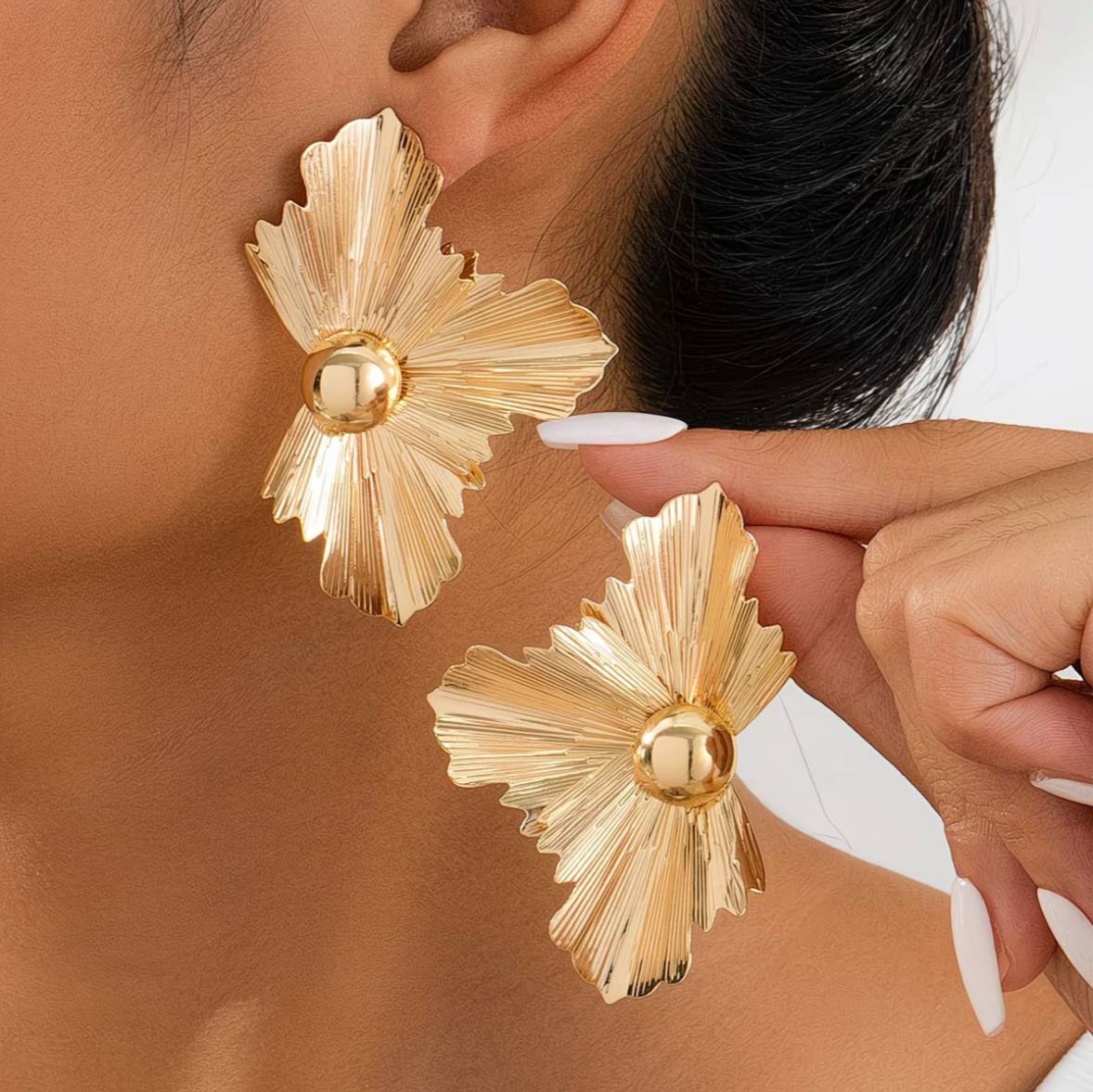 Sculptural gold statement earrings