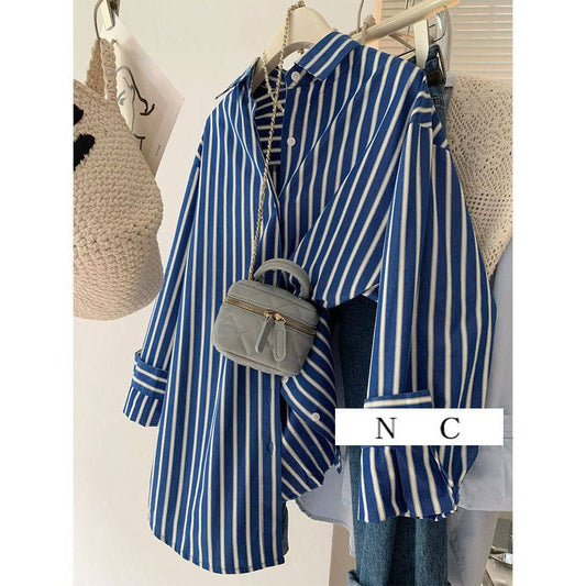 Blue and white striped oversized button-up shirt