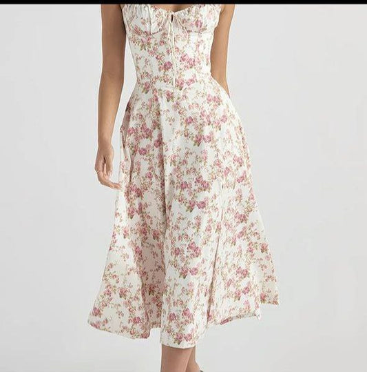 White midi dress with a pink floral print