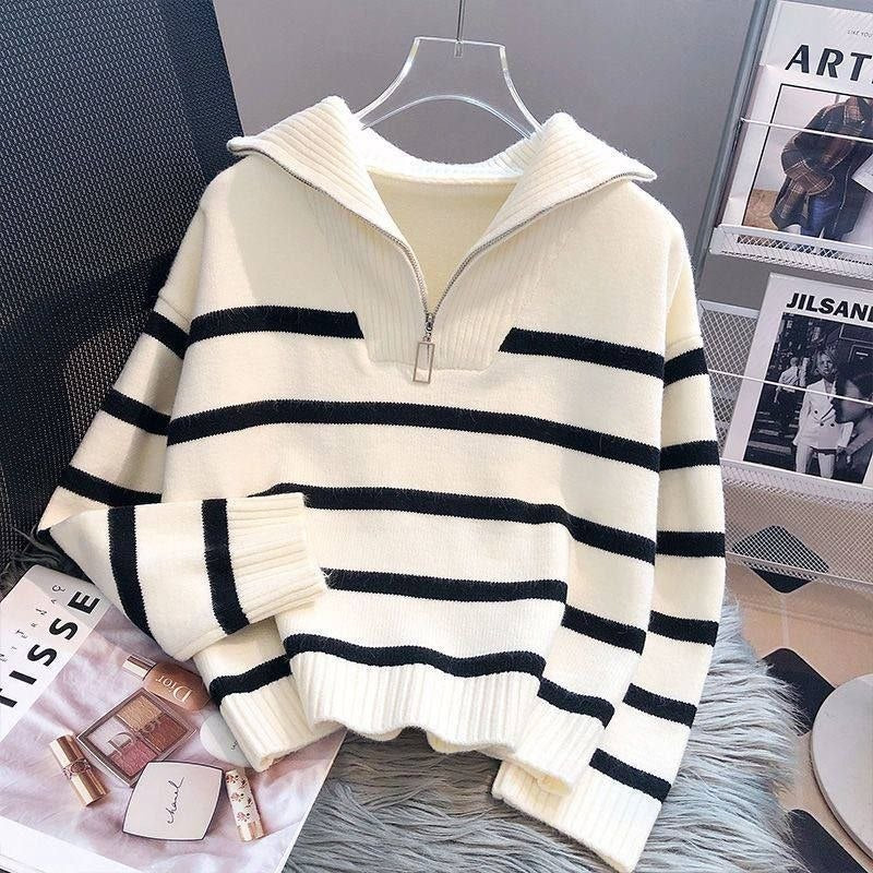 Cream-colored striped half-zip knit sweater