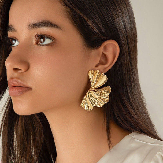 Gold-plated, sculptural leaf or petal statement earrings