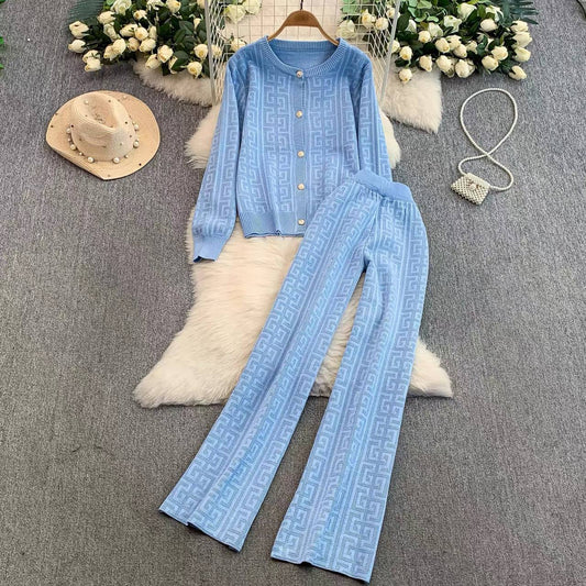 Two-piece light blue knitted set features a long-sleeved cardigan