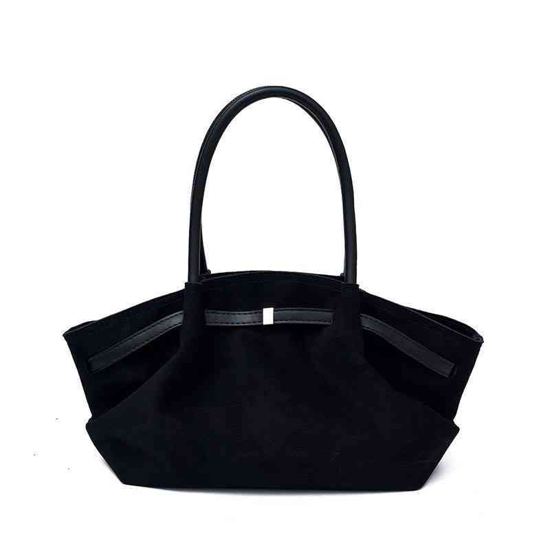 slouchy winged trapeze tote bag
