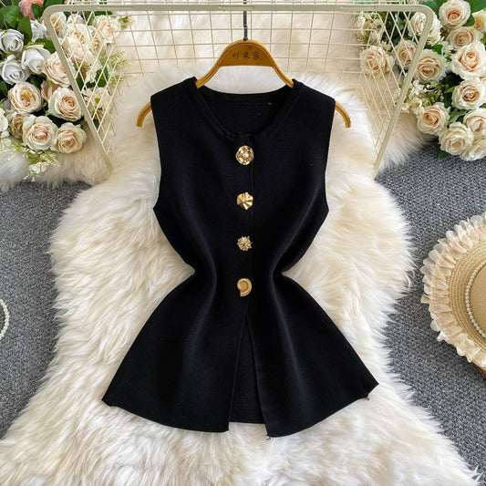 Black sleeveless knit peplum vest