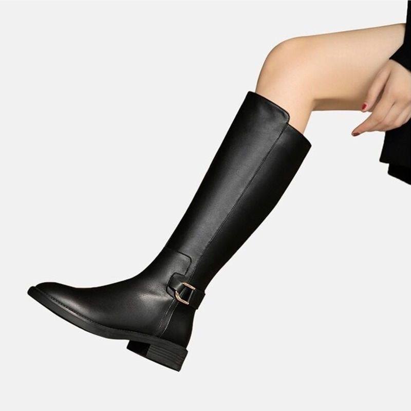 Minimalist black leather knee-high boots