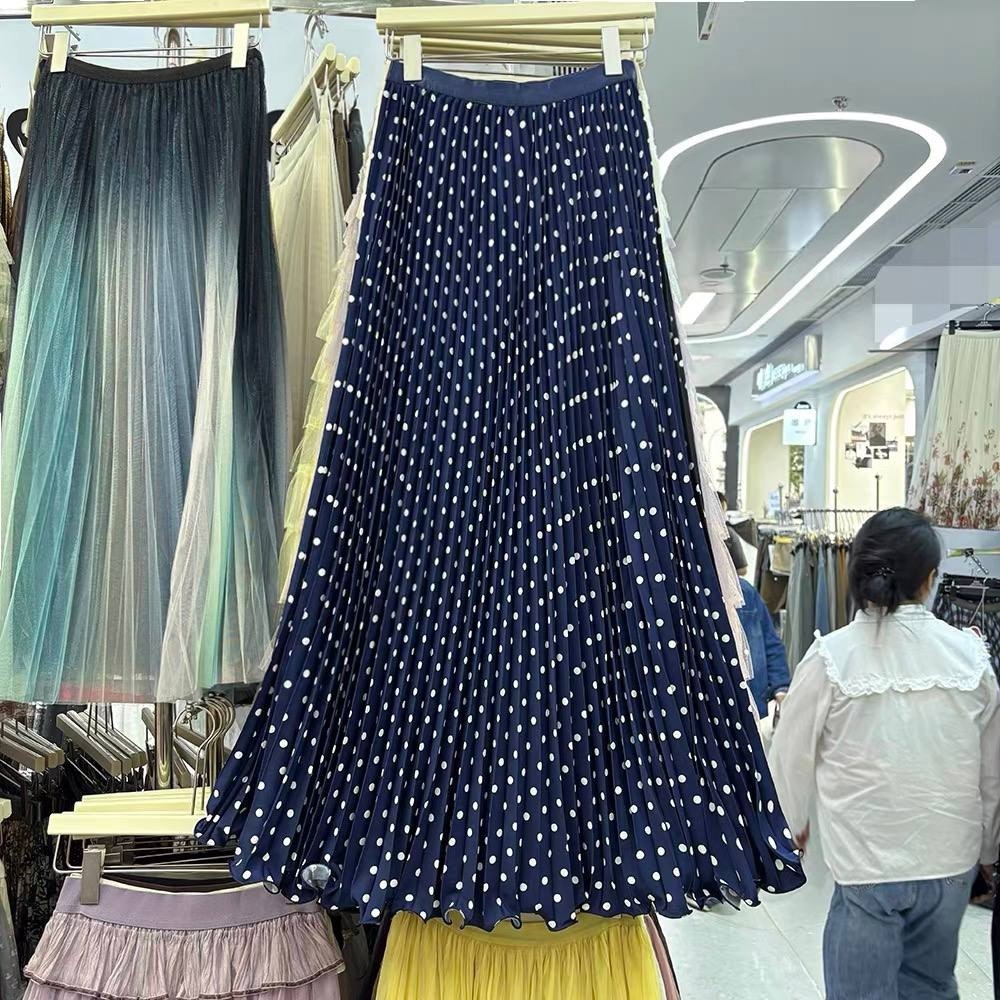 Navy blue pleated maxi skirt with white polka dots