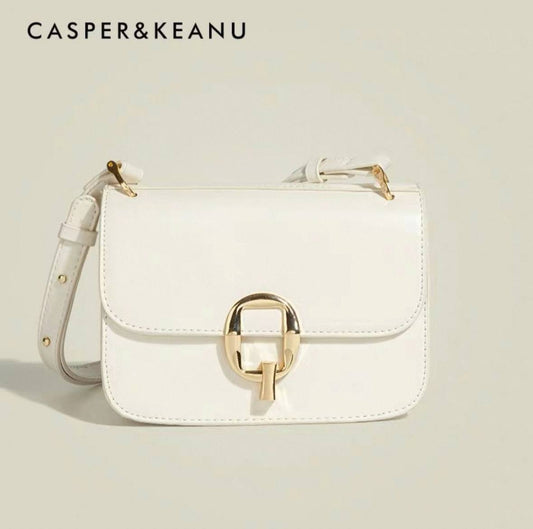 White crossbody bag with a gold clasp