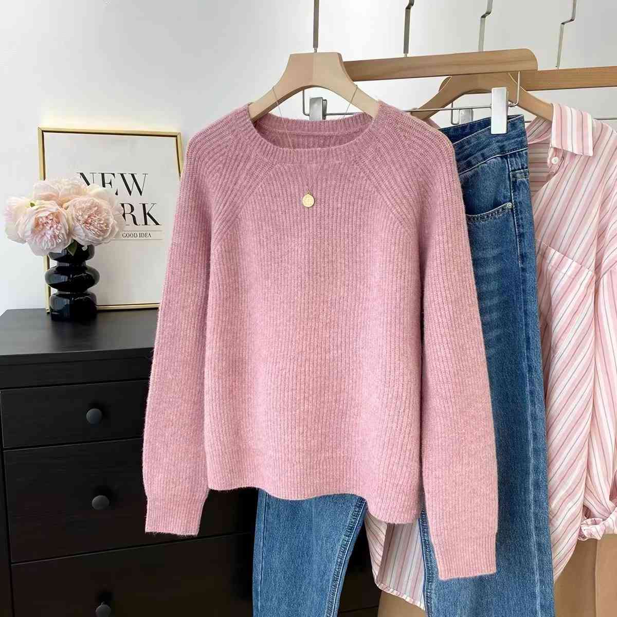 Classic pink-colored raglan sweater