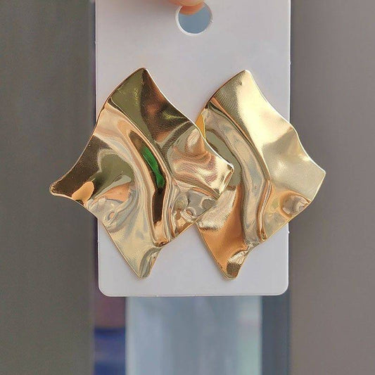 Geometric crinkle or wavy gold statement earrings