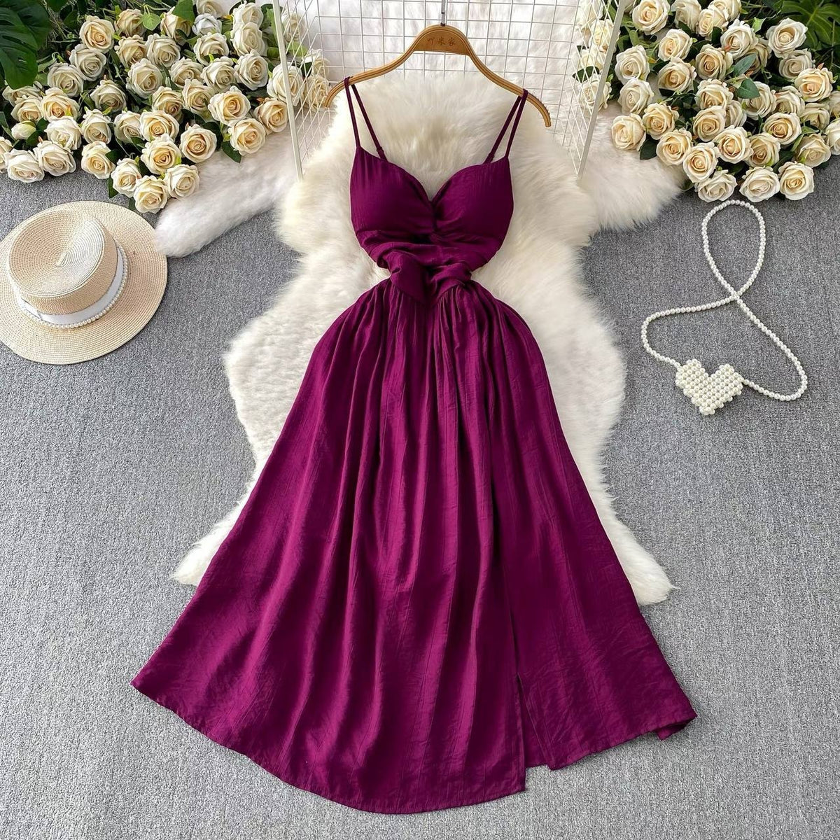 Purple or burgundy sleeveless spaghetti-strap maxi dress