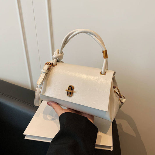 White, small, square top-handle handbag