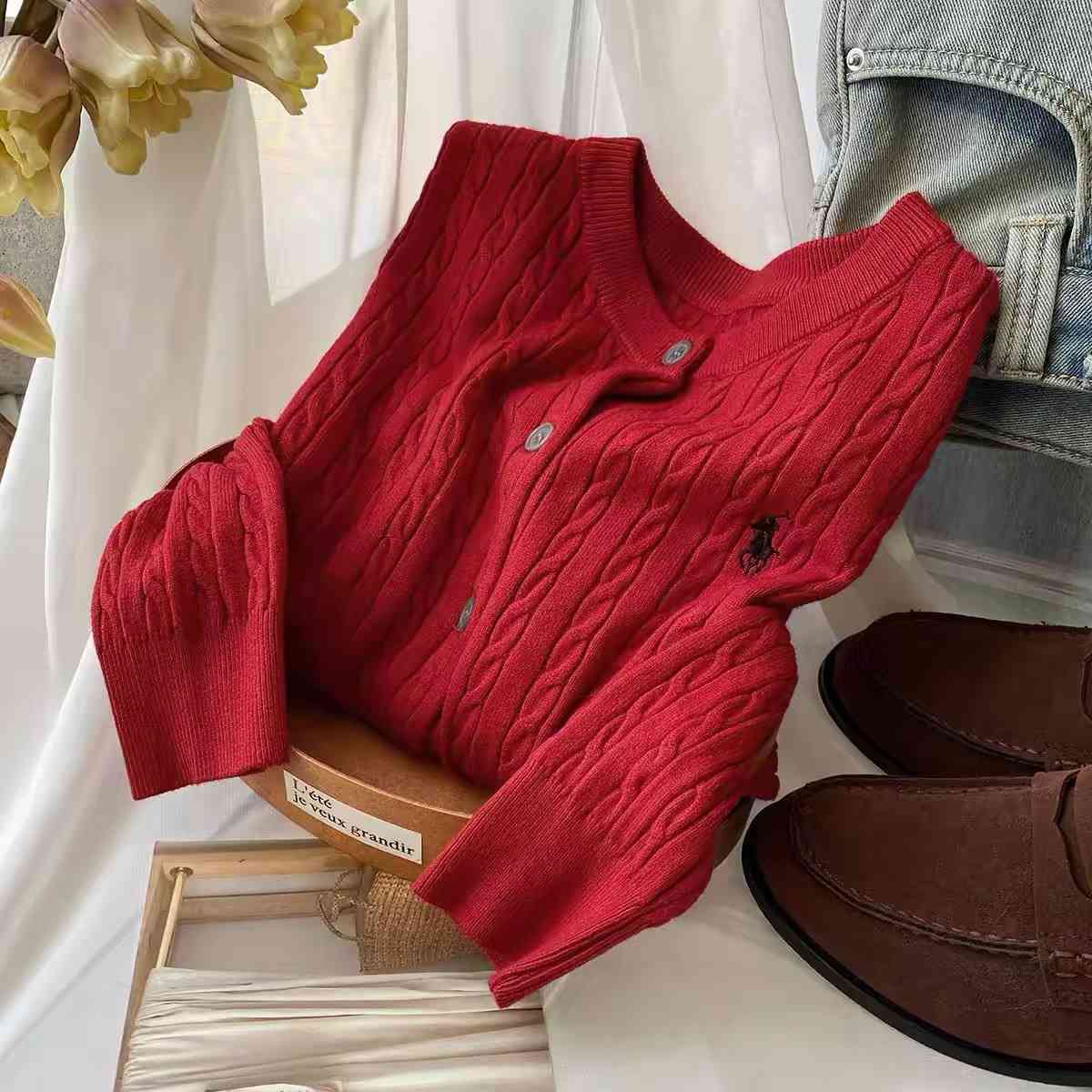 Vibrant red cable knit cardigan