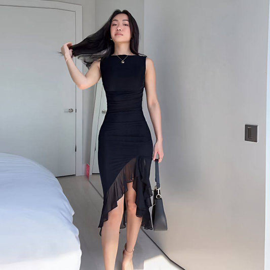 Black sleeveless midi dress with an asymmetrical ruffled hem