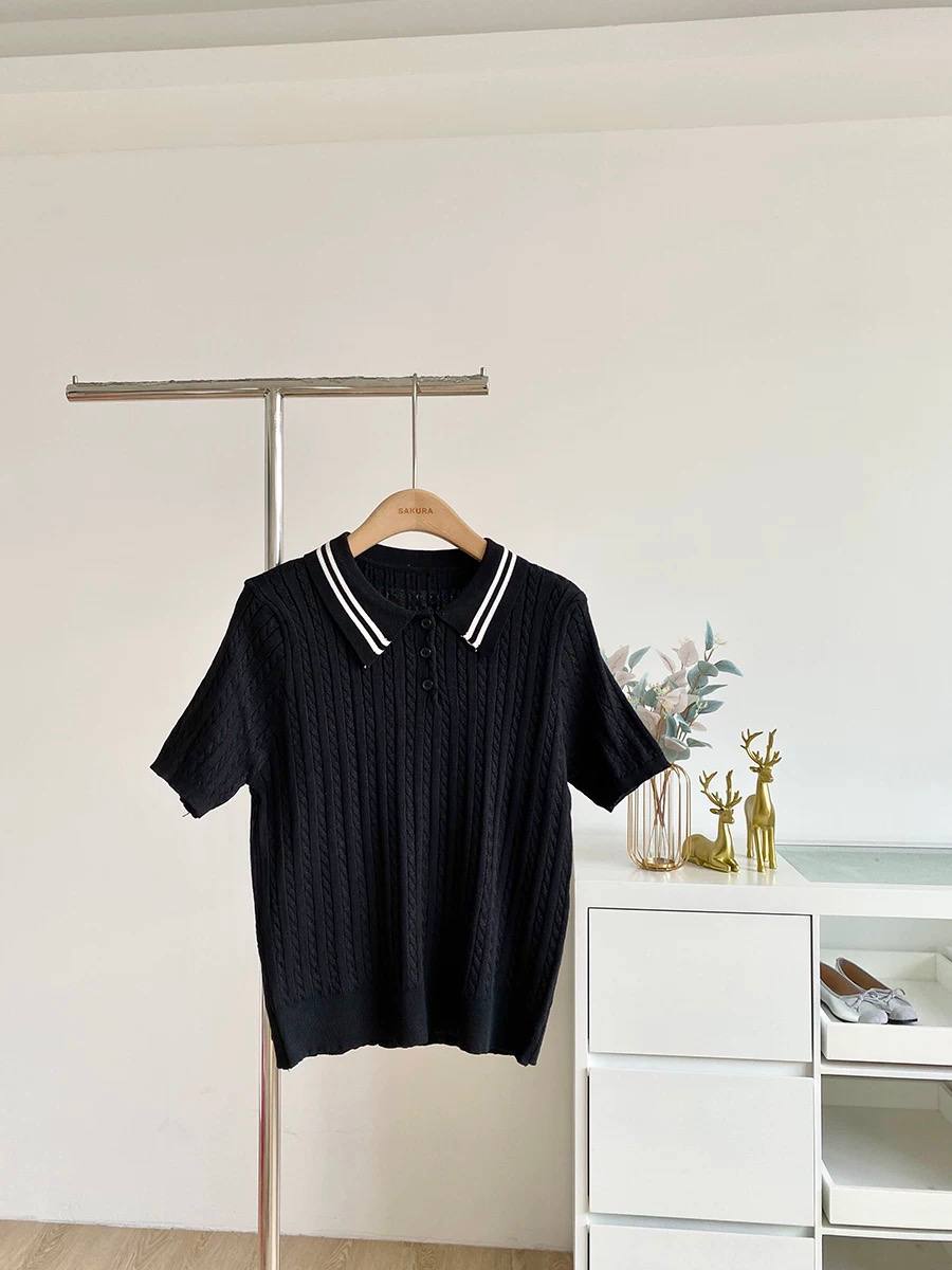 Black cable-knit polo shirt