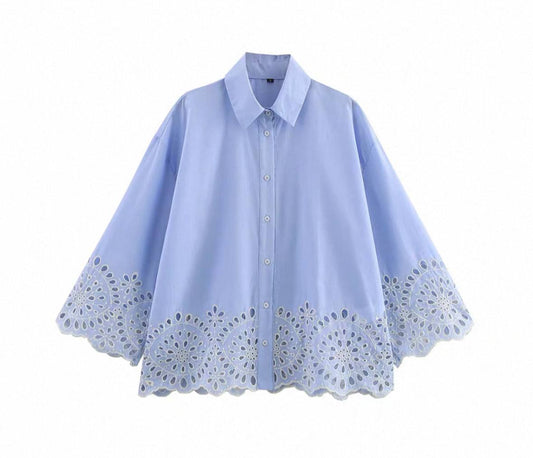 Blue poplin shirt features cutwork embroidery