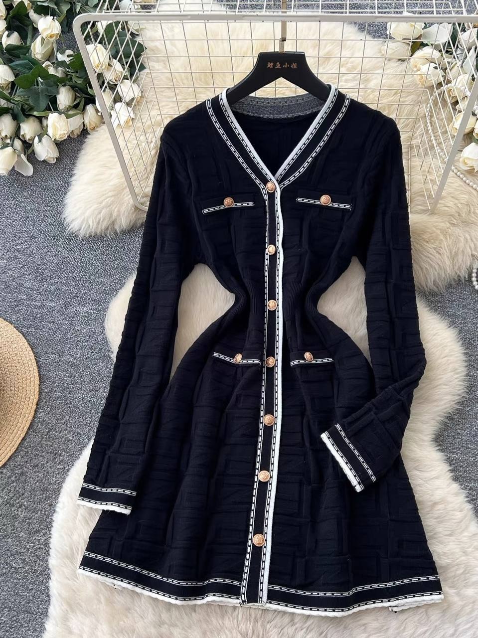 Black knitted V-neck mini dress