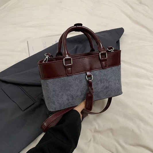 Retro-inspired color block bucket bag